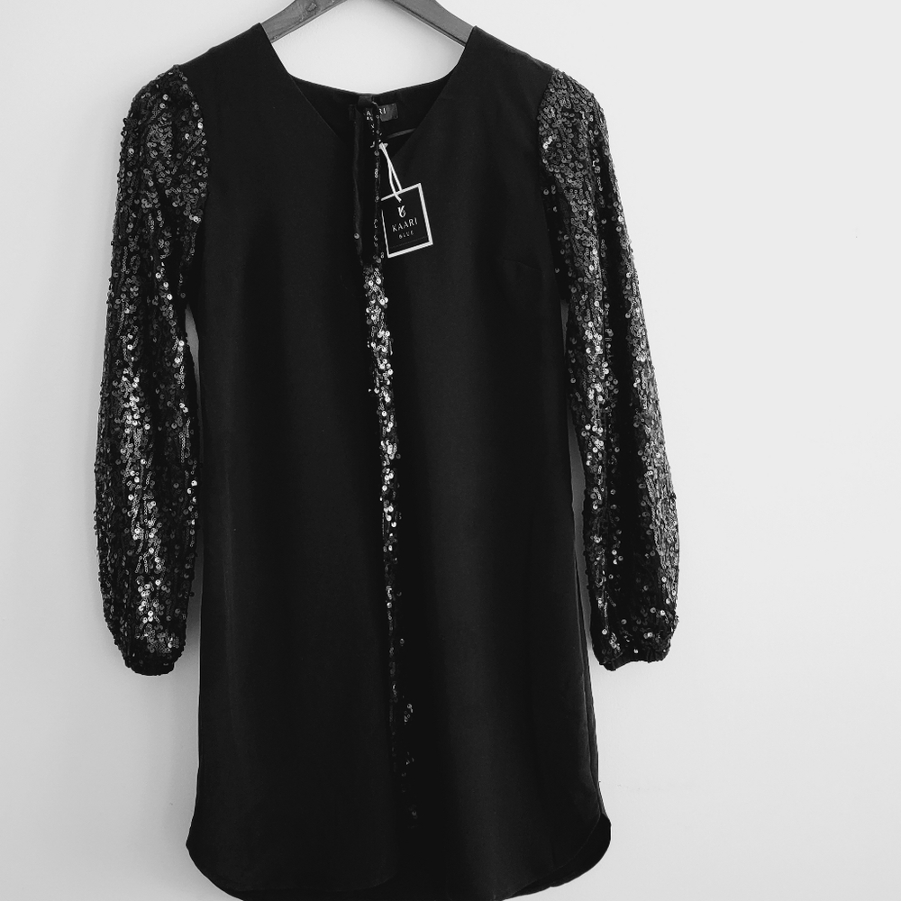New Black dress with sequin sleeves size XS. Great holidays / New Years